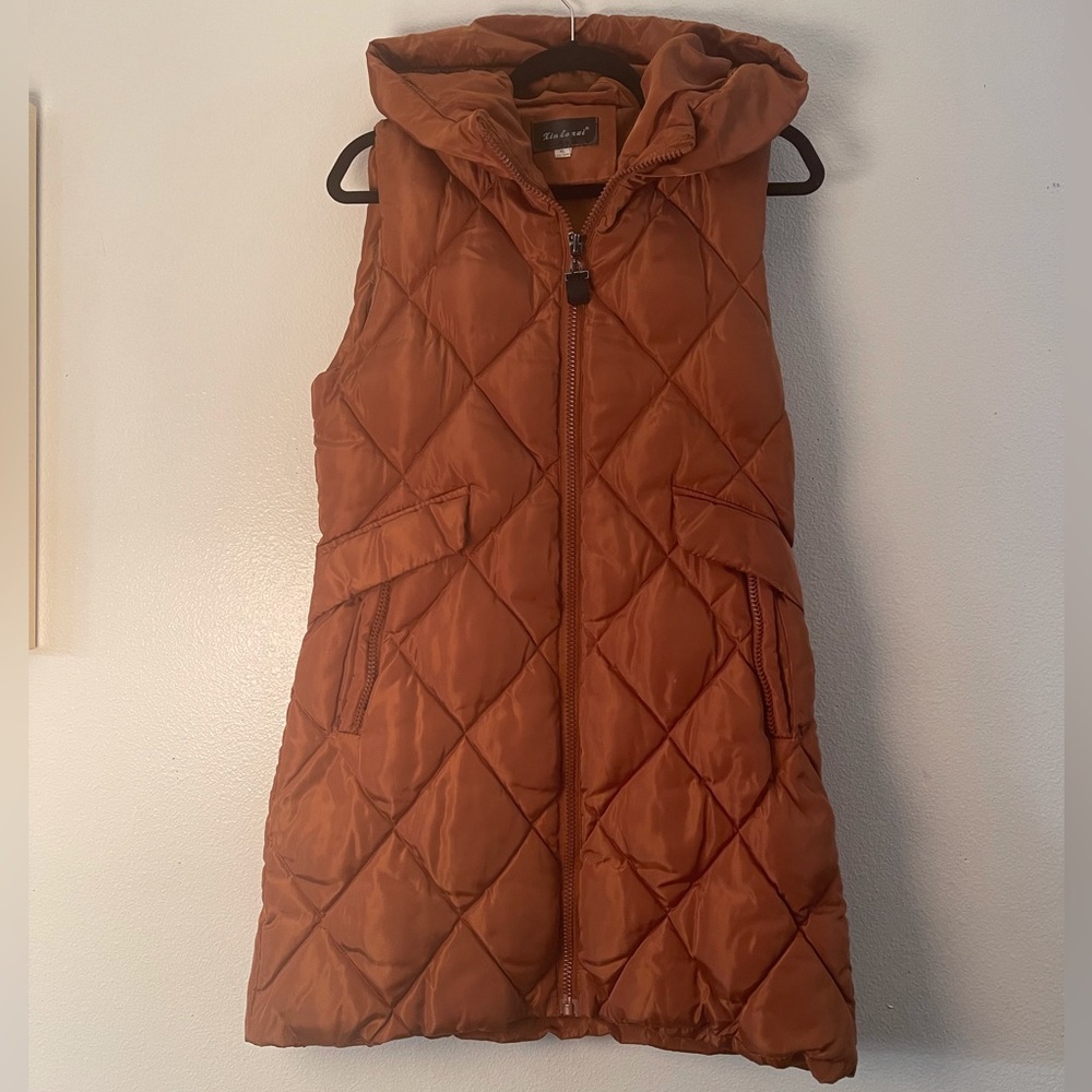 Burnt orange Fantasy vest with hood ,would fit a young girl or petite woman.